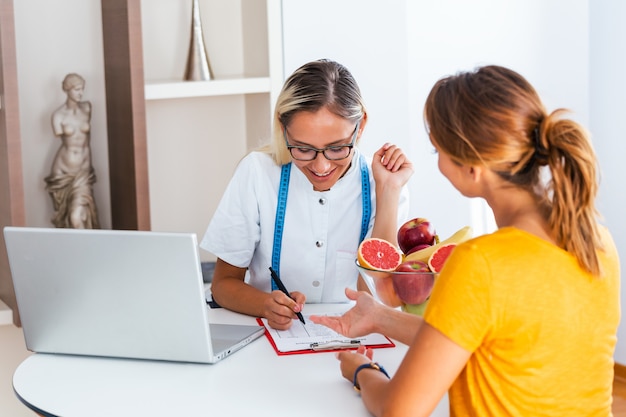 female nutritionist giving consultation patient 1212 1563 1